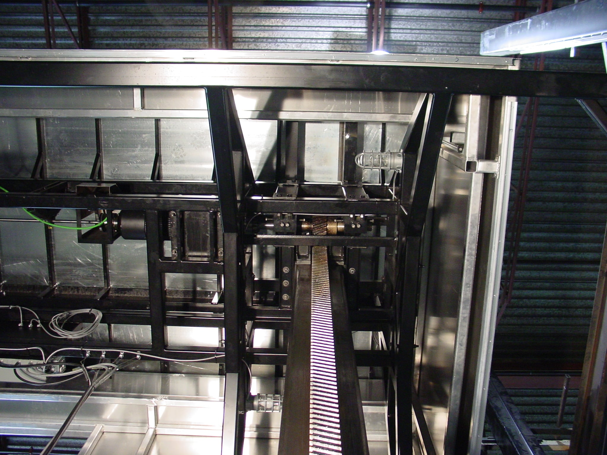 Stage lift rack and pignion